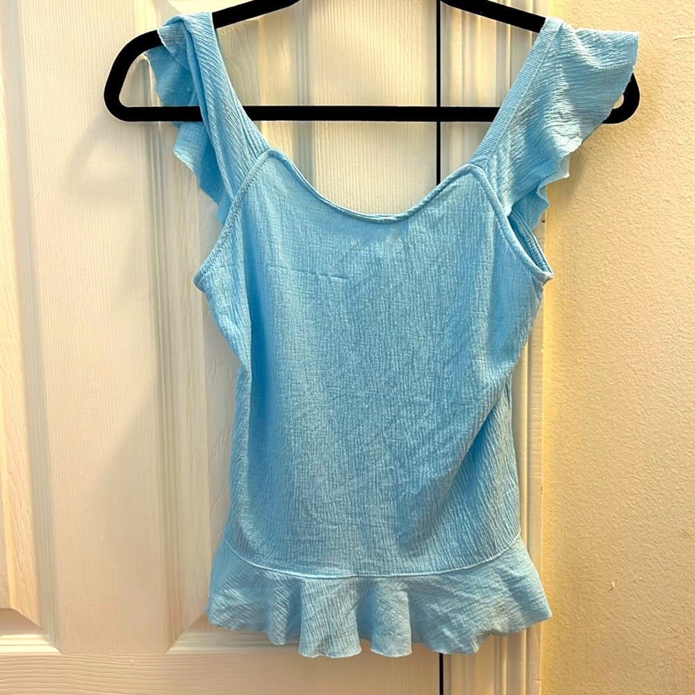 Blue ERGE designs tank